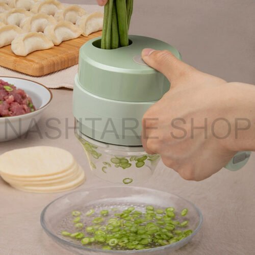 kf-Se233a6df9be34de88428fa1263116e8ey-4-in-1-Handheld-Electric-Vegetable-Cutter-Set-Kitchen-Tools-For-Garlic-Pepper-Chili-Onion-Celery Handheld Electric Vegetable Cutter | اداة تقطيع خضار كهربائية